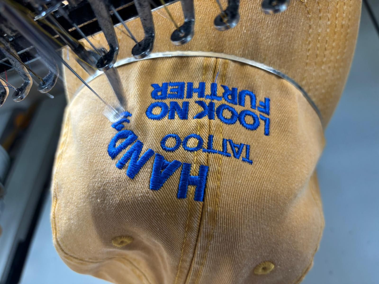 Cap embroidery in production